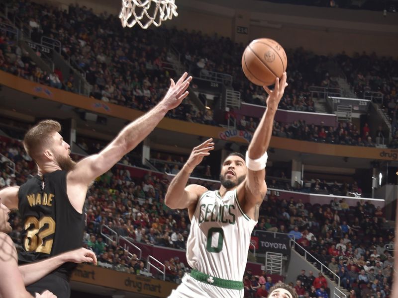 CLEVELAND, OH - MARCH 5: Jayson Tatum #0 of the Boston Celtics drives to the basket during the game against the Cleveland Cavaliers on March 5, 2024 at Rocket Mortgage FieldHouse in Cleveland, Ohio. NOTE TO USER: User expressly acknowledges and agrees that, by downloading and/or using this Photograph, user is consenting to the terms and conditions of the Getty Images License Agreement. Mandatory Copyright Notice: Copyright 2024 NBAE (Photo by David Liam Kyle/NBAE via Getty Images)