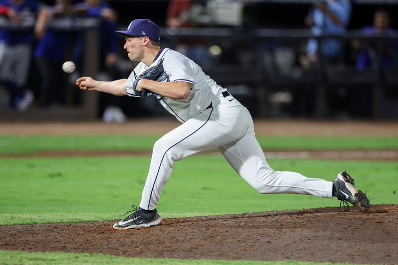 Sep 15, 2025; Tampa, Florida, USA; Tampa Bay Rays pitcher Kevin Kelly (49) throws a pitch against the Toronto Blue Jays in the eleventh inning  at George M. Steinbrenner Field. Mandatory Credit: Nathan Ray Seebeck-Imagn Images