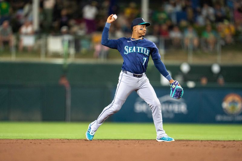 May 6, 2025; West Sacramento, California, USA;  Seattle Mariners designated hitter Jorge Polanco (7) throws out Athletics designated hitter Brent Rooker (not pictured) during the sixth inning) at Sutter Health Park. Mandatory Credit: Neville E. Guard-Imagn Images