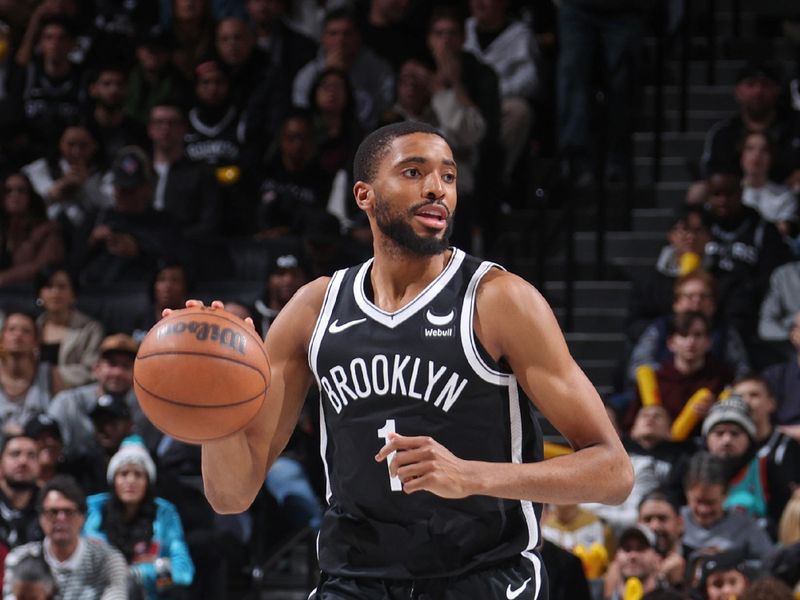 BROOKLYN, NY - FEBRUARY 10: Mikal Bridges #1 of the Brooklyn Nets brings the ball up court during the game against the San Antonio Spurs on February 10, 2024 at Barclays Center in Brooklyn, New York. NOTE TO USER: User expressly acknowledges and agrees that, by downloading and or using this Photograph, user is consenting to the terms and conditions of the Getty Images License Agreement. Mandatory Copyright Notice: Copyright 2024 NBAE (Photo by Nathaniel S. Butler/NBAE via Getty Images)