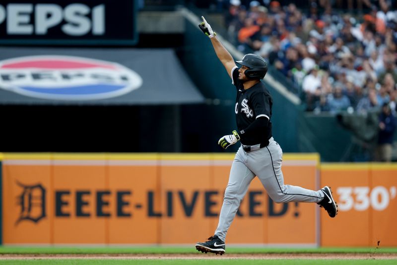 Sep 29, 2024; Detroit, Michigan, USA;  Chicago White Sox third baseman Lenyn Sosa (50) celebrates after he hits a three run home run in the third inning against the Detroit Tigers at Comerica Park. Mandatory Credit: Rick Osentoski-Imagn Images