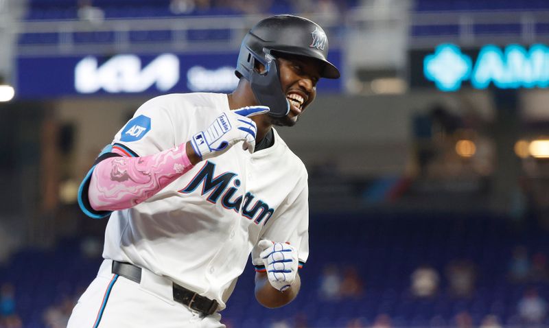 Jun 18, 2024; Miami, Florida, USA; Miami Marlins right fielder Jesus Sanchez (12) reacts after his three run home run against the St. Louis Cardinals in the first inning at loanDepot Park. Mandatory Credit: Rhona Wise-USA TODAY Sports