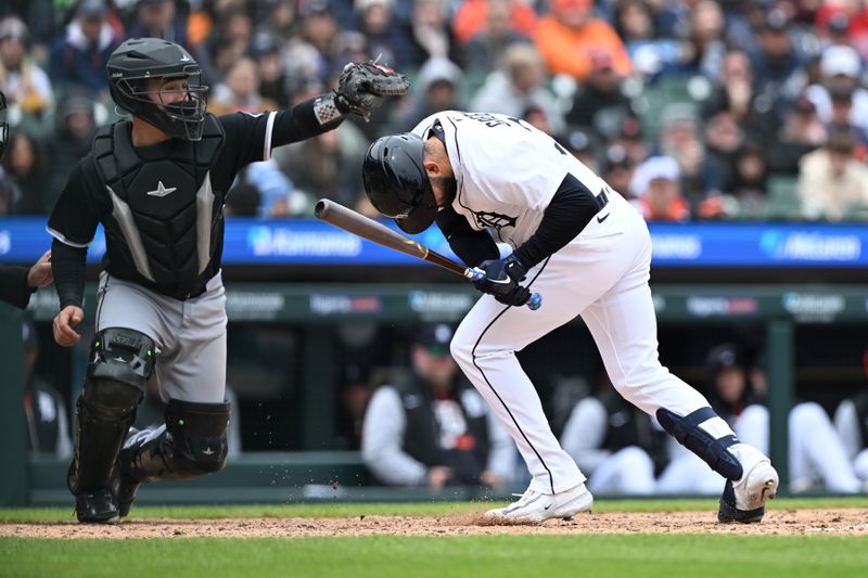 Apr 6, 2025; Detroit, Michigan, USA;  Detroit Tigers designated hitter Riley Greene (31) ducks out of the way of a high inside pitch from Chicago White Sox pitcher Cam Booser (not pictured) in the eighth inning at Comerica Park. Mandatory Credit: Lon Horwedel-Imagn Images