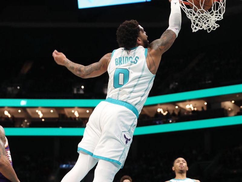 CHARLOTTE, NC - JANUARY 07:  Miles Bridges #0 of the Charlotte Hornets shoots the ball during the game against the Phoenix Suns on January 07, 2025 at Spectrum Center in Charlotte, North Carolina. NOTE TO USER: User expressly acknowledges and agrees that, by downloading and or using this photograph, User is consenting to the terms and conditions of the Getty Images License Agreement. Mandatory Copyright Notice: Copyright 2025 NBAE (Photo by Brock Williams-Smith/NBAE via Getty Images)