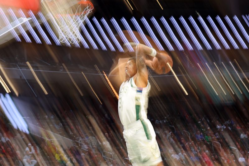 MILWAUKEE, WISCONSIN - OCTOBER 14: MarJon Beauchamp #3 of the Milwaukee Bucks dunks against the Chicago Bulls during the second half of a preseason game at Fiserv Forum on October 14, 2024 in Milwaukee, Wisconsin.  NOTE TO USER: User expressly acknowledges and agrees that, by downloading and or using this photograph, User is consenting to the terms and conditions of the Getty Images License Agreement. (Photo by Stacy Revere/Getty Images)