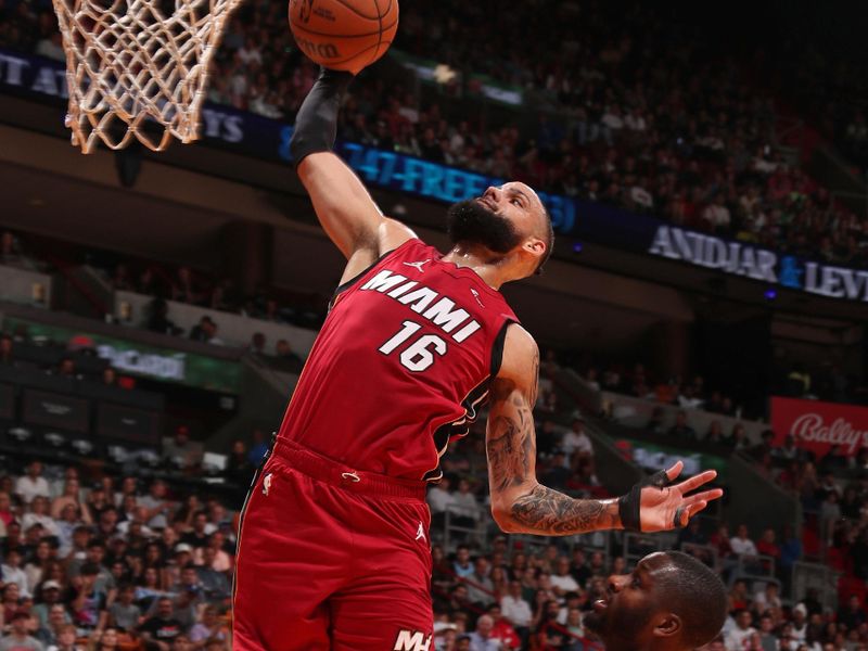 MIAMI, FL - MARCH 10: Caleb Martin #16 of the Miami Heat dunks the ball during the game against the Washington Wizards on March 10, 2024 at Kaseya Center in Miami, Florida. NOTE TO USER: User expressly acknowledges and agrees that, by downloading and or using this Photograph, user is consenting to the terms and conditions of the Getty Images License Agreement. Mandatory Copyright Notice: Copyright 2024 NBAE (Photo by Issac Baldizon/NBAE via Getty Images)