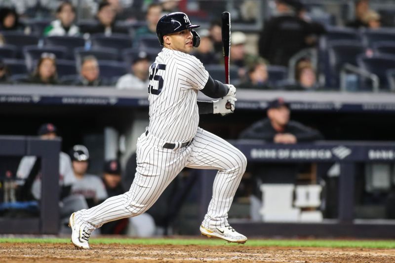 May 2, 2023; Bronx, New York, USA;  New York Yankees second baseman Gleyber Torres (25) hits a double in the sixth inning against the Cleveland Guardians at Yankee Stadium. Mandatory Credit: Wendell Cruz-USA TODAY Sports