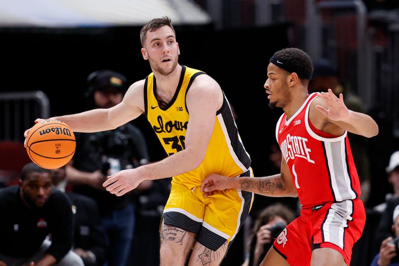 Mar 9, 2023; Chicago, IL, USA; Iowa Hawkeyes guard Connor McCaffery (30) looks to pass the ball against Ohio State Buckeyes guard Roddy Gayle Jr. (1) during the first half at United Center. Mandatory Credit: Kamil Krzaczynski-USA TODAY Sports