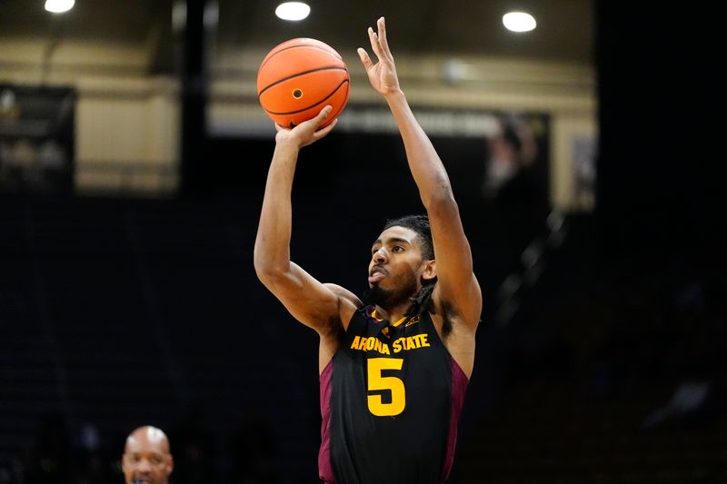 Jan 28, 2025; Boulder, Colorado, USA; Arizona State Sun Devils guard Amier Ali (5) controls the ball in the first half against the Colorado Buffaloes at CU Events Center. Mandatory Credit: Ron Chenoy-Imagn Images