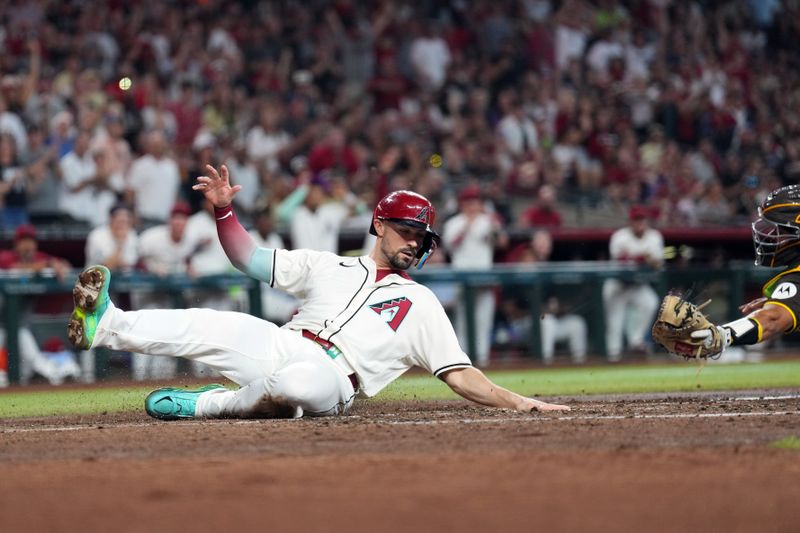 Sep 29, 2024; Phoenix, Arizona, USA; Arizona Diamondbacks outfielder Randal Grichuk (15) beats the tag of San Diego Padres catcher Kyle Higashioka (20) to score a run during the fourth inning at Chase Field. Mandatory Credit: Joe Camporeale-Imagn Images