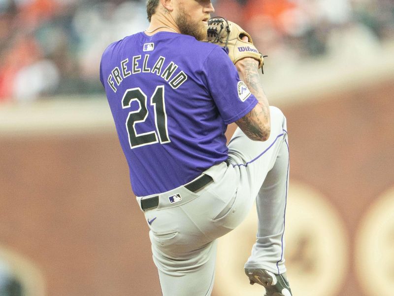 Jul 26, 2024; San Francisco, California, USA;  Colorado Rockies pitcher Kyle Freeland (21) pitches during the first inning against the San Francisco Giants at Oracle Park. Mandatory Credit: Stan Szeto-USA TODAY Sports