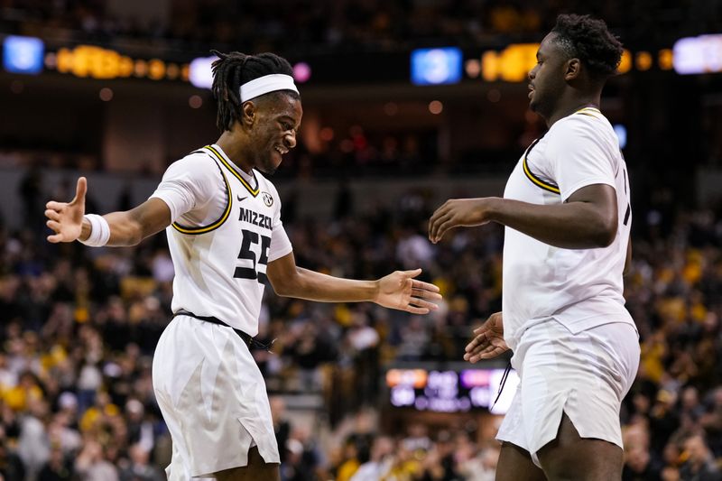 Feb 1, 2023; Columbia, Missouri, USA; Missouri Tigers guard Sean East II (55) celebrates with guard Kaleb Brown (1) during the first half against the LSU Tigers at Mizzou Arena. Mandatory Credit: Jay Biggerstaff-USA TODAY Sports