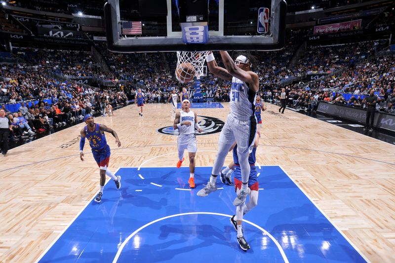 ORLANDO, FL - FEBRUARY 9: Wendell Carter Jr. #34 of the Orlando Magic dunks the ball during the game against the Denver Nuggets on February 9, 2023 at Amway Center in Orlando, Florida. NOTE TO USER: User expressly acknowledges and agrees that, by downloading and or using this photograph, User is consenting to the terms and conditions of the Getty Images License Agreement. Mandatory Copyright Notice: Copyright 2023 NBAE (Photo by Fernando Medina/NBAE via Getty Images)