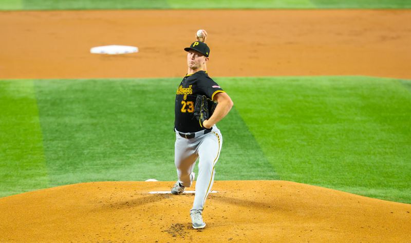 Aug 20, 2024; Arlington, Texas, USA; Pittsburgh Pirates starting pitcher Mitch Keller (23) throws during the first inning against the Texas Rangers  at Globe Life Field. Mandatory Credit: Kevin Jairaj-USA TODAY Sports
