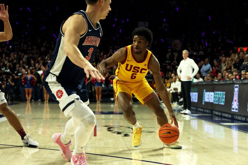 Jan 17, 2024; Tucson, Arizona, USA; USC Trojans guard Bronny James (6) drives to the net against Arizona Wildcats guard Pelle Larsson (3) during the first half at McKale Center. Mandatory Credit: Zachary BonDurant-USA TODAY Sports