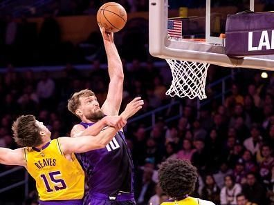 LOS ANGELES, CA - NOVEMBER 15: Domantas Sabonis #10 of the Sacramento Kings dunks the ball during the game against the Los Angeles Lakers on November 15, 2023 at Crypto.Com Arena in Los Angeles, California. NOTE TO USER: User expressly acknowledges and agrees that, by downloading and/or using this Photograph, user is consenting to the terms and conditions of the Getty Images License Agreement. Mandatory Copyright Notice: Copyright 2023 NBAE (Photo by Tyler Ross/NBAE via Getty Images)