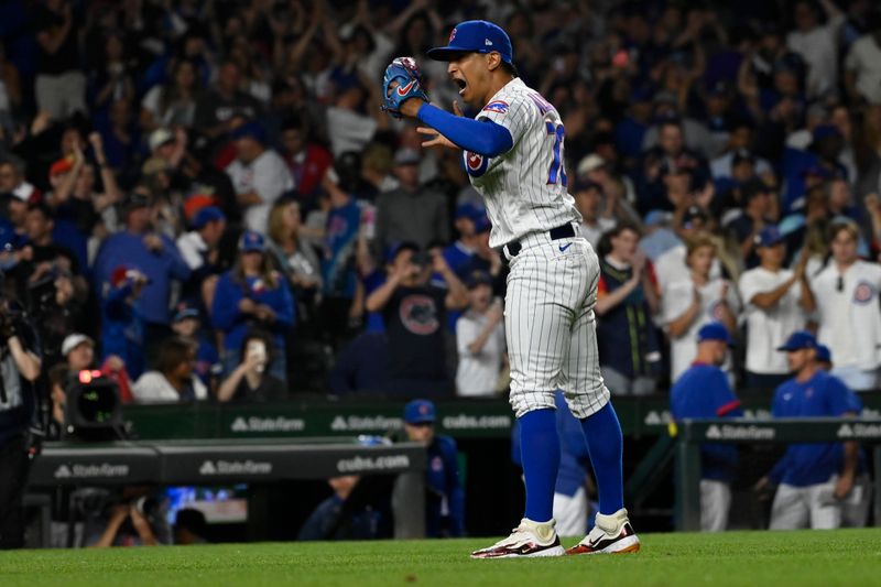 May 30, 2023; Chicago, Illinois, USA;  Chicago Cubs relief pitcher Adbert Alzolay (73) celebrates at the end of the game against the Tampa Bay Rays at Wrigley Field. Mandatory Credit: Matt Marton-USA TODAY Sports