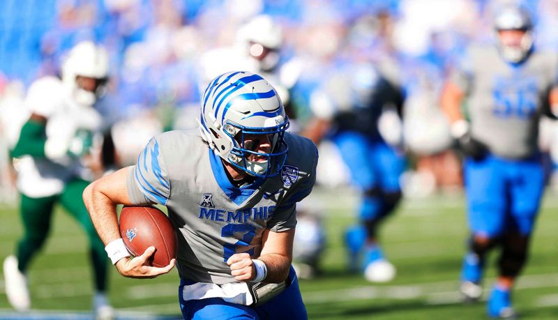 Nov 4, 2023; Memphis, Tennessee, USA;  Memphis Tigers  Seth Henigan (2) rushes toward the end zone against South Florida at Simmons Bank Liberty Stadium. Mandatory Credit: Stu Boyd II-USA TODAY Sports