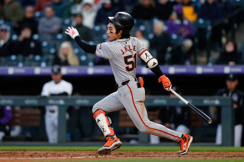 May 7, 2024; Denver, Colorado, USA; San Francisco Giants center fielder Jung Hoo Lee (51) hits a single in the fourth inning against the Colorado Rockies at Coors Field. Mandatory Credit: Isaiah J. Downing-USA TODAY Sports