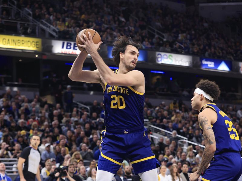 INDIANAPOLIS, IN - FEBRUARY 8:  Dario Saric #20 of the Golden State Warriors  grabs the rebound during the game on February 8, 2024  at Gainbridge Fieldhouse in Indianapolis, Indiana. NOTE TO USER: User expressly acknowledges and agrees that, by downloading and or using this Photograph, user is consenting to the terms and conditions of the Getty Images License Agreement. Mandatory Copyright Notice: Copyright 2024 NBAE (Photo by Justin Casterline/NBAE via Getty Images)