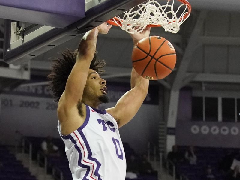 Nov 17, 2022; Fort Worth, Texas, USA; TCU Horned Frogs guard Micah Peavy (0) dunks the ball during the second half against the Louisiana Monroe Warhawks at Ed and Rae Schollmaier Arena. Mandatory Credit: Raymond Carlin III-USA TODAY Sports