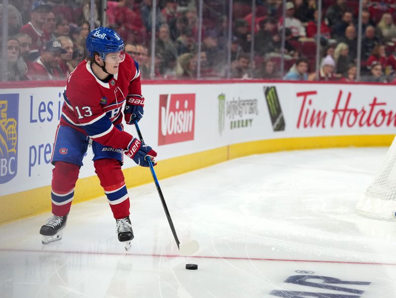 Dec 9, 2025; Montreal, Quebec, CAN; Montreal Canadiens forward Cole Caufield (13) plays the puck during the second period of the game against the Tampa Bay Lightning at the Bell Centre. Mandatory Credit: Eric Bolte-Imagn Images