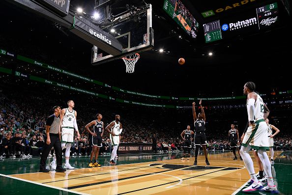 BOSTON, MA - NOVEMBER 10: Day'Ron Sharpe #20 of the Brooklyn Nets shoots a free throw during the game against the Boston Celtics during the In-Season Tournament on November 10, 2023 at the TD Garden in Boston, Massachusetts. NOTE TO USER: User expressly acknowledges and agrees that, by downloading and or using this photograph, User is consenting to the terms and conditions of the Getty Images License Agreement. Mandatory Copyright Notice: Copyright 2023 NBAE  (Photo by Brian Babineau/NBAE via Getty Images)