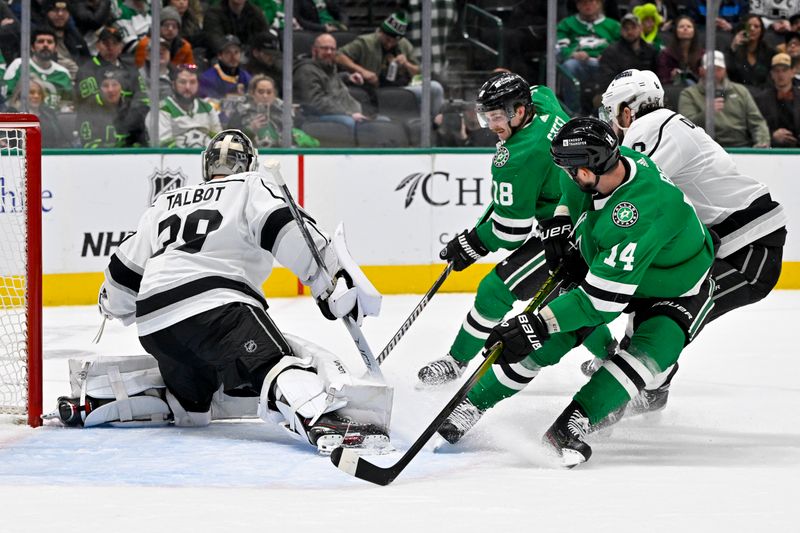 Jan 16, 2024; Dallas, Texas, USA; Los Angeles Kings goaltender Cam Talbot (39) stops a shot by Dallas Stars left wing Jamie Benn (14) and center Sam Steel (18) during the second period at the American Airlines Center. Mandatory Credit: Jerome Miron-USA TODAY Sports