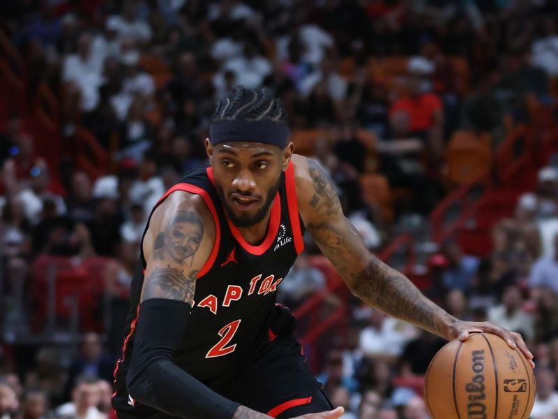 MIAMI, FLORIDA - APRIL 14: Jalen McDaniels #2 of the Toronto Raptors dribbles the ball against the Miami Heat during the fourth quarter of the game at Kaseya Center on April 14, 2024 in Miami, Florida. NOTE TO USER: User expressly acknowledges and agrees that, by downloading and or using this photograph, User is consenting to the terms and conditions of the Getty Images License Agreement. (Photo by Megan Briggs/Getty Images)