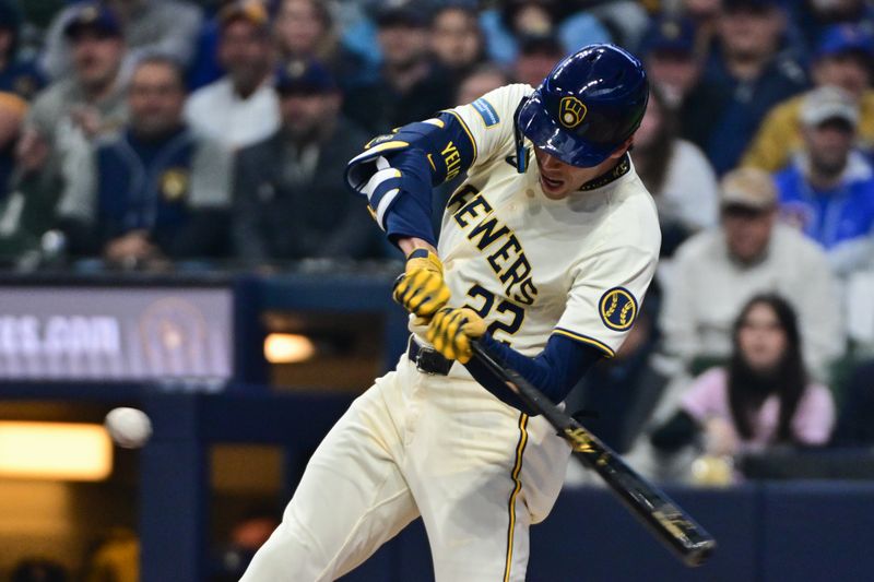 Apr 2, 2024; Milwaukee, Wisconsin, USA; Milwaukee Brewers left fielder Christian Yelich (22) hits a solo home run in the third inning against the Minnesota Twins at American Family Field. Mandatory Credit: Benny Sieu-USA TODAY Sports