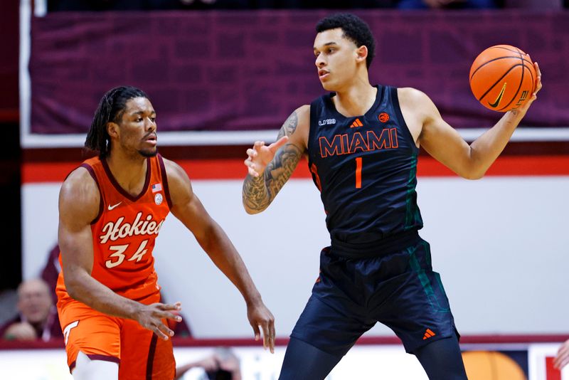 Jan 4, 2025; Blacksburg, Virginia, USA; Miami Hurricanes center Lynn Kidd (1) handles the ball against Virginia Tech Hokies forward Mylyjael Poteat (34) during the first half at Cassell Coliseum. Mandatory Credit: Peter Casey-Imagn Images