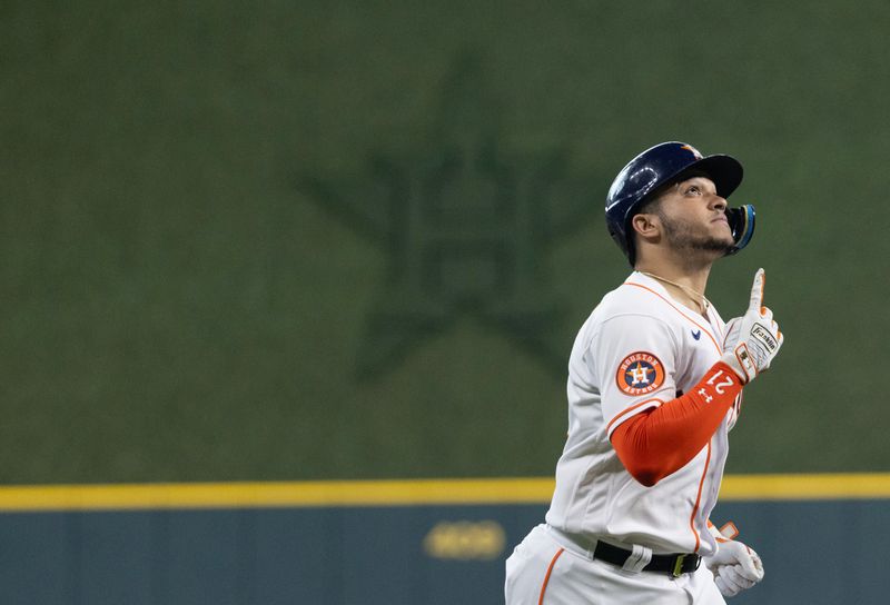 Jul 5, 2023; Houston, Texas, USA; Houston Astros catcher Yainer Diaz (21) reacts after hitting a home run against the Colorado Rockies in the second inning at Minute Maid Park. Mandatory Credit: Thomas Shea-USA TODAY Sports