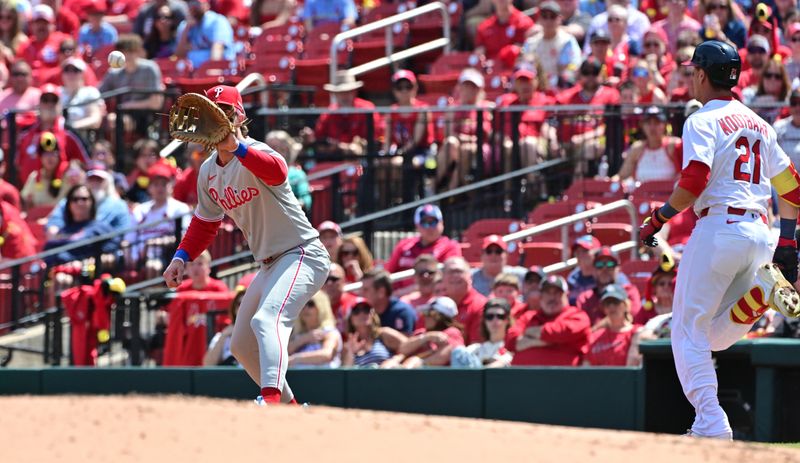 Apr 13, 2025; St. Louis, Missouri, USA; Philadelphia Phillies first baseman Bryce Harper (3) catches the throw as St. Louis Cardinals outfielder Lars Nootbaar (21, right) was thrown out at first base in the first inning at Busch Stadium. Mandatory Credit: Tim Vizer-Imagn Images