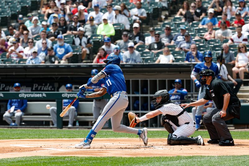 Jun 8, 2025; Chicago, Illinois, USA; Kansas City Royals shortstop Maikel Garcia (11) doubles against the Chicago White Sox during the first inning at Rate Field. Mandatory Credit: Kamil Krzaczynski-Imagn Images
