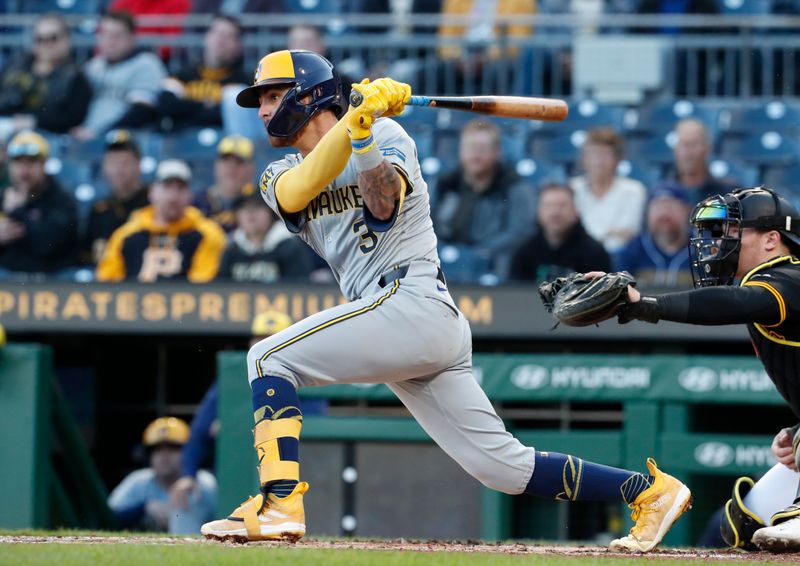 Apr 22, 2024; Pittsburgh, Pennsylvania, USA;  Milwaukee Brewers third baseman Joey Ortiz (3) hits a single against the Pittsburgh Pirates during the third inning at PNC Park. Mandatory Credit: Charles LeClaire-USA TODAY Sports