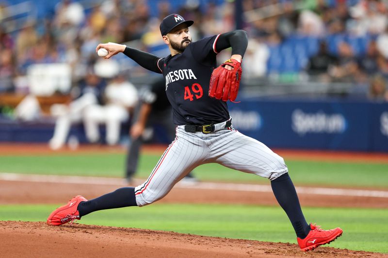 Sep 5, 2024; St. Petersburg, Florida, USA; Minnesota Twins pitcher Pablo Lopez (49) throws a pitch against the Tampa Bay Rays in the third inning at Tropicana Field. Mandatory Credit: Nathan Ray Seebeck-Imagn Images