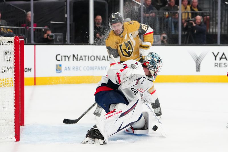 Mar 28, 2026; Las Vegas, Nevada, USA; Washington Capitals goaltender Logan Thompson (48) makes a save as Vegas Golden Knights right wing Mark Stone (61) looks for a rebound during the first period at T-Mobile Arena. Mandatory Credit: Stephen R. Sylvanie-Imagn Images