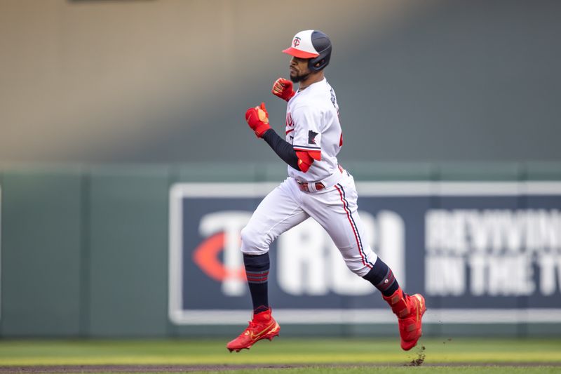 May 23, 2023; Minneapolis, Minnesota, USA; Minnesota Twins designated hitter Byron Buxton (25) rounds the bases after hitting a two run home run in the first inning against the San Francisco Giants at Target Field. Mandatory Credit: Jesse Johnson-USA TODAY Sports