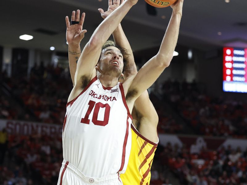 Jan 6, 2024; Norman, Oklahoma, USA; Oklahoma Sooners forward Sam Godwin (10) shoots in front of Iowa State Cyclones forward Robert Jones (12) during the second half at Lloyd Noble Center. Mandatory Credit: Alonzo Adams-USA TODAY Sports