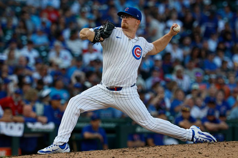 Sep 28, 2025; Chicago, Illinois, USA; Chicago Cubs relief pitcher Jordan Wicks (36) delivers a pitch against the St. Louis Cardinals during the ninth inning at Wrigley Field. Mandatory Credit: Kamil Krzaczynski-Imagn Images