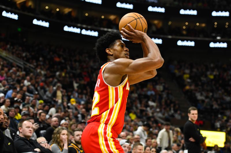 SALT LAKE CITY, UTAH - FEBRUARY 03: De'Andre Hunter #12 of the Atlanta Hawks shoots during the second half of a game against the Utah Jazz at Vivint Arena on February 03, 2023 in Salt Lake City, Utah.  NOTE TO USER: User expressly acknowledges and agrees that, by downloading and or using this photograph, User is consenting to the terms and conditions of the Getty Images License Agreement. (Photo by Alex Goodlett/Getty Images)