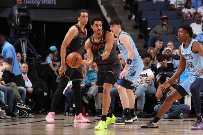 MEMPHIS, TN - MARCH 12: Jordan Poole #13 of the Washington Wizards looks to pass the ball during the game against the Memphis Grizzlies on March 12, 2024 at FedExForum in Memphis, Tennessee. NOTE TO USER: User expressly acknowledges and agrees that, by downloading and or using this photograph, User is consenting to the terms and conditions of the Getty Images License Agreement. Mandatory Copyright Notice: Copyright 2024 NBAE (Photo by Joe Murphy/NBAE via Getty Images)