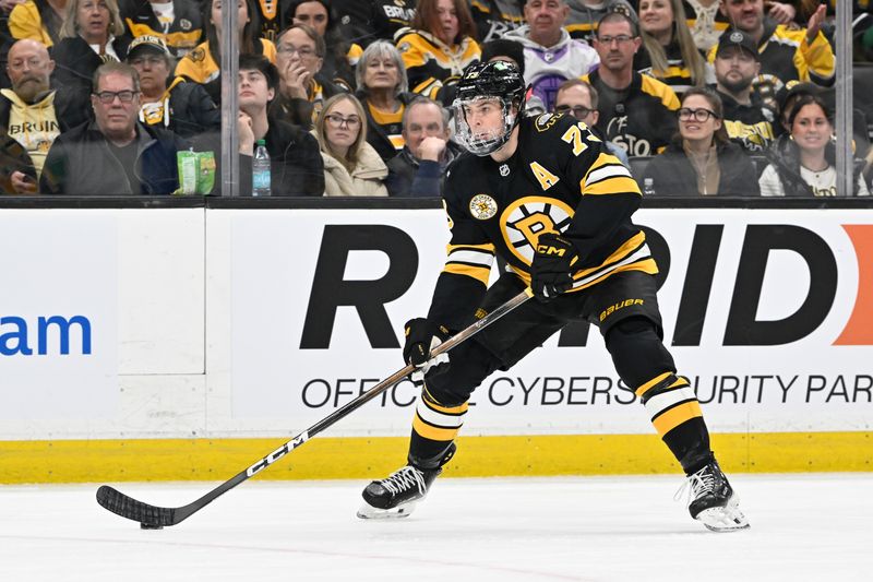 Jan 15, 2026; Boston, Massachusetts, USA; Boston Bruins defenseman Charlie McAvoy (73) skates with the puck during the third period against the Seattle Kraken at TD Garden. Mandatory Credit: Eric Canha-Imagn Images