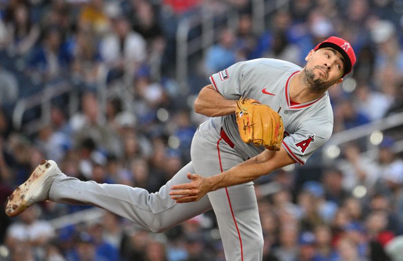 Aug 22, 2024; Toronto, Ontario, CAN;  Los Angeles Angels starting pitcher Brock Burke (46) delivers a pitch against the Toronto Blue Jays in the first inning at Rogers Centre. Mandatory Credit: Dan Hamilton-USA TODAY Sports