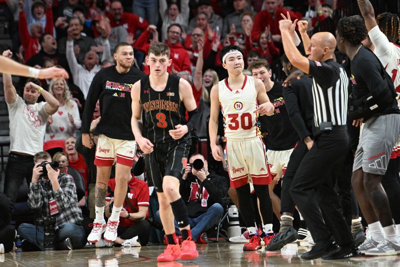 Feb 11, 2023; Lincoln, Nebraska, USA;  Nebraska Cornhuskers guard Keisei Tominaga (30) reacts after hitting a three point basket against the Wisconsin Badgers in the second half at Pinnacle Bank Arena. Mandatory Credit: Steven Branscombe-USA TODAY Sports