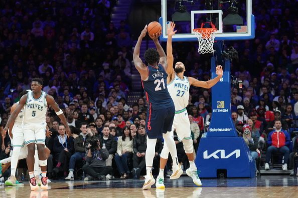 PHILADELPHIA, PA - DECEMBER 20: Joel Embiid #21 of the Philadelphia 76ers shoots a three point basket against the Minnesota Timberwolves on December 20, 2023 at the Wells Fargo Center in Philadelphia, Pennsylvania NOTE TO USER: User expressly acknowledges and agrees that, by downloading and/or using this Photograph, user is consenting to the terms and conditions of the Getty Images License Agreement. Mandatory Copyright Notice: Copyright 2023 NBAE (Photo by Jesse D. Garrabrant/NBAE via Getty Images)