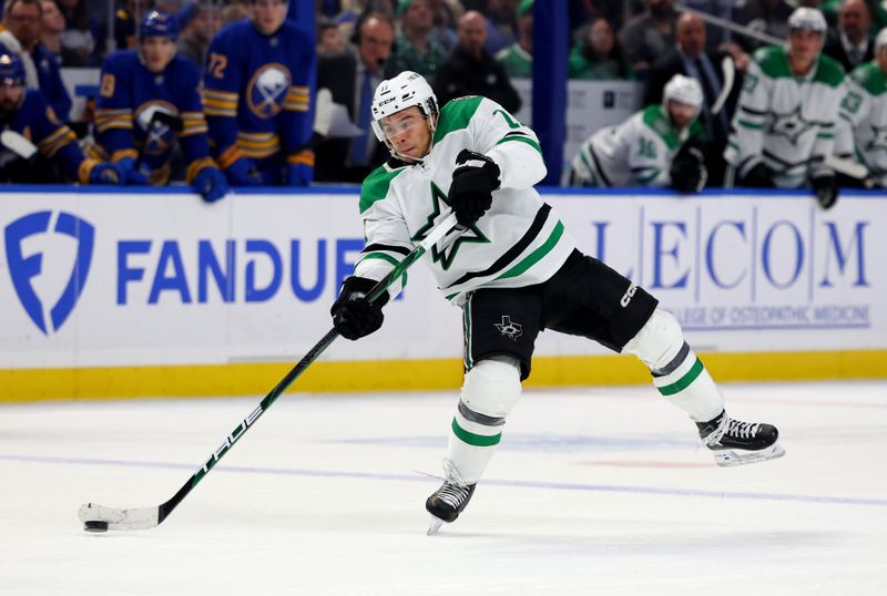 Oct 22, 2024; Buffalo, New York, USA;  Dallas Stars center Logan Stankoven (11) takes a shot on goal during the third period against the Buffalo Sabres at KeyBank Center. Mandatory Credit: Timothy T. Ludwig-Imagn Images