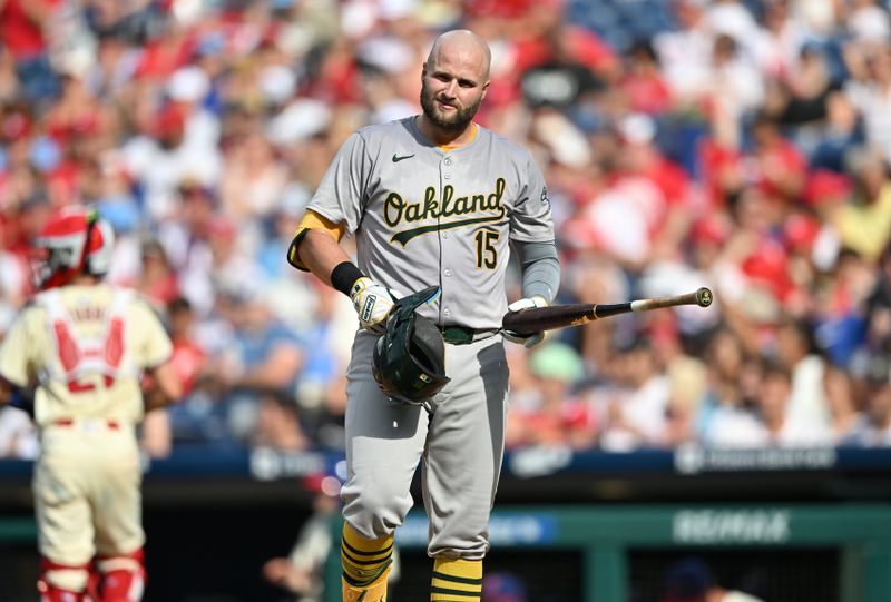 Jul 13, 2024; Philadelphia, Pennsylvania, USA; Oakland Athletics first baseman Seth Brown (15) reacts after striking out against the Philadelphia Phillies in the fourth inning at Citizens Bank Park. Mandatory Credit: Kyle Ross-USA TODAY Sports