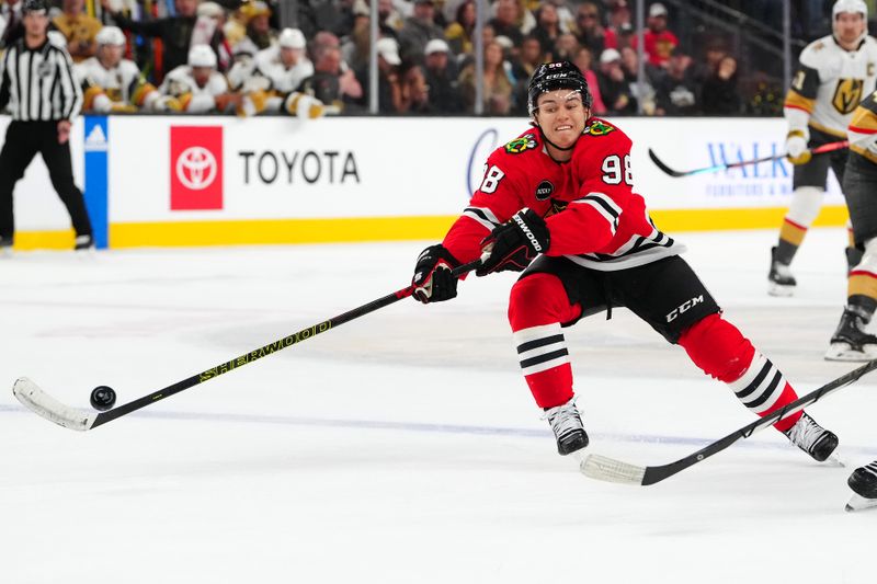 Oct 27, 2023; Las Vegas, Nevada, USA; Chicago Blackhawks center Connor Bedard (98) skates against the Vegas Golden Knights during the second period at T-Mobile Arena. Mandatory Credit: Stephen R. Sylvanie-USA TODAY Sports