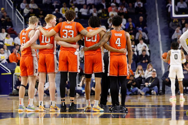 Jan 18, 2024; Ann Arbor, Michigan, USA;  Illinois Fighting Illini forward Marcus Domask (3) guard Luke Goode (10) forward Coleman Hawkins (33) forward Ty Rodgers (20) and guard Justin Harmon (4) stand together during a technical foul shot in the second half mw at Crisler Center. Mandatory Credit: Rick Osentoski-USA TODAY Sports